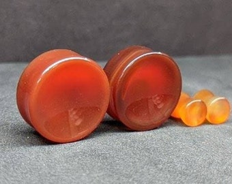 Concave pluggen van rode agaat