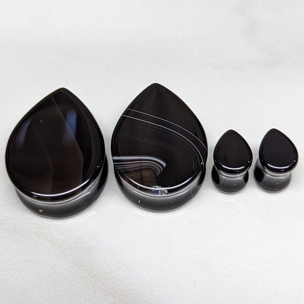 Teardrop-steenpluggen zwarte agaat: dubbele flare-meters