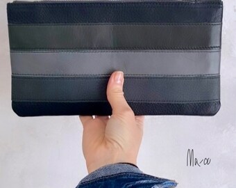 Striped leather clutch in shades of black and grey. Scandinavian style clutch.