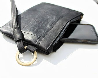 Black leather pouch. Genuine leather  Clutch bag with wrist strap. Rock chic evening bag