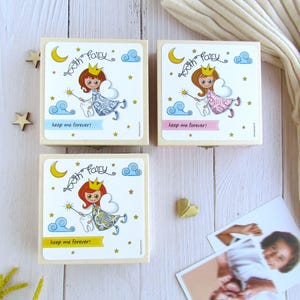 May include: Three wooden boxes with tooth fairy designs. Each box features a different colored fairy with a crown, wings, and a wand. The boxes have the text "Tooth Fairy" and "Keep me forever!" printed on them.