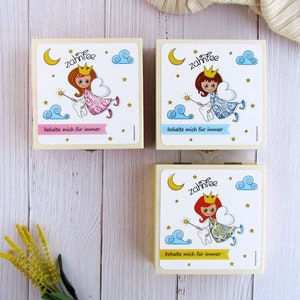 May include: Three wooden boxes with a tooth fairy theme. Each box features a different tooth fairy illustration with a tooth, a wand, and clouds. The text on the boxes reads "Zahnfee" and "behalte mich f&uuml;r immer".