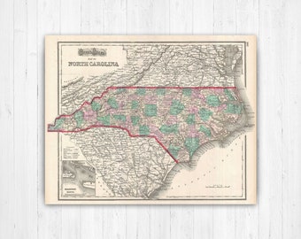 May include: An antique map of North Carolina, featuring a detailed depiction of the state's counties. The map is framed with a red border and includes the text "Map of North Carolina". The map has a vintage aesthetic with a cream-colored background.