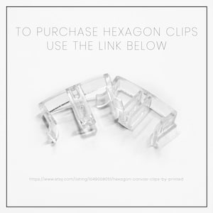 May include: Clear plastic hexagon clips for hanging canvas prints. To purchase, use the link below: https://www.etsy.com/listing/1049008051/hexagon-canvas-clips-by-printed
