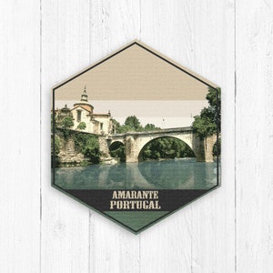 May include: A vintage-style illustration of a bridge over a river in Amarante, Portugal. The illustration features a stone bridge with a church in the background.