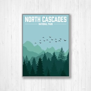 May include: A retro-style poster with a blue sky and mountains in the background. The text "NORTH CASCADES NATIONAL PARK" is at the top of the poster. A flock of birds flies over the mountains.