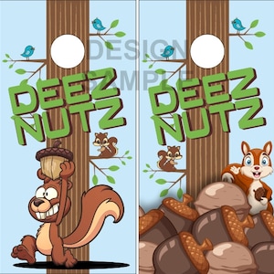 May include: Two blue and green cornhole boards with the text "Deez Nutz" on each board. The boards are decorated with cartoon squirrels and acorns.