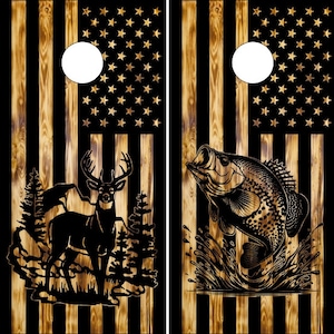 May include: Two wooden cornhole boards with an American flag design. One board features a silhouette of a deer in a forest setting, while the other board features a silhouette of a fish jumping out of water.