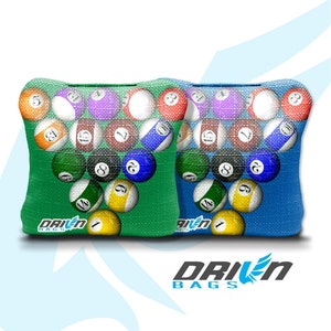 May include: Two bean bags with a green and blue fabric exterior. The fabric has a pattern of billiard balls with numbers. The bean bags have the text "Driven Bags" printed on them.