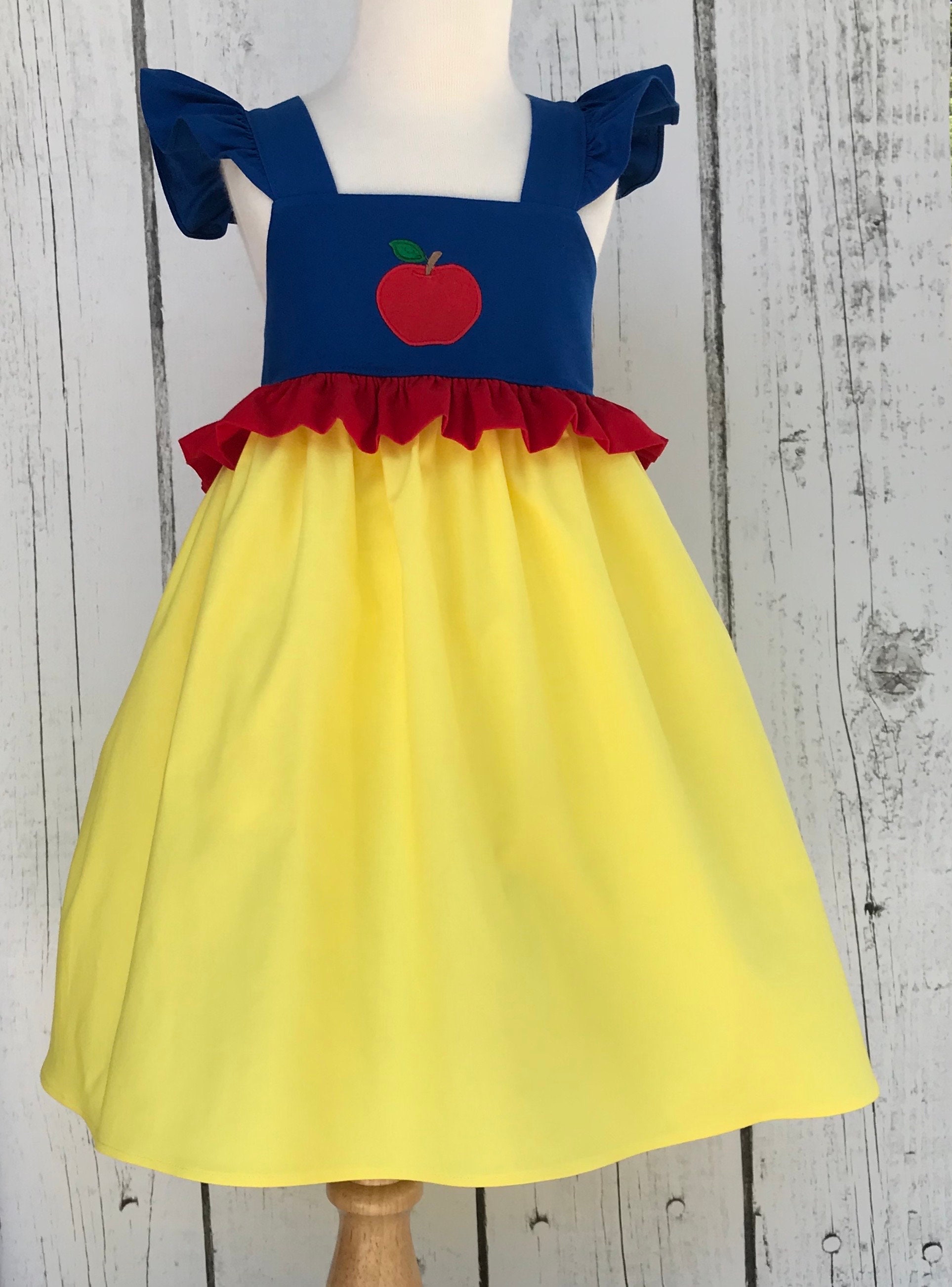 yellow dress with red apples Yellow Dress with Red Apples