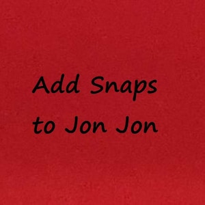 May include: Red fabric with the text "Add Snaps to Jon Jon" written in black.