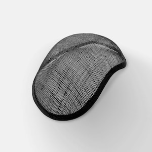 May include: Black hat base made of a woven straw-like material. The base is shaped like a rounded oval and has a smooth, finished edge.