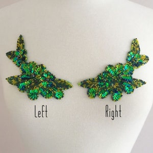 May include: A pair of green and gold sequined appliques, one labelled "Left" and the other "Right".