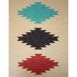 May include: Three geometric patterned fabric wall hangings in a turquoise, black, and red color scheme. The hangings are in the shape of a diamond with a pointed top and bottom.