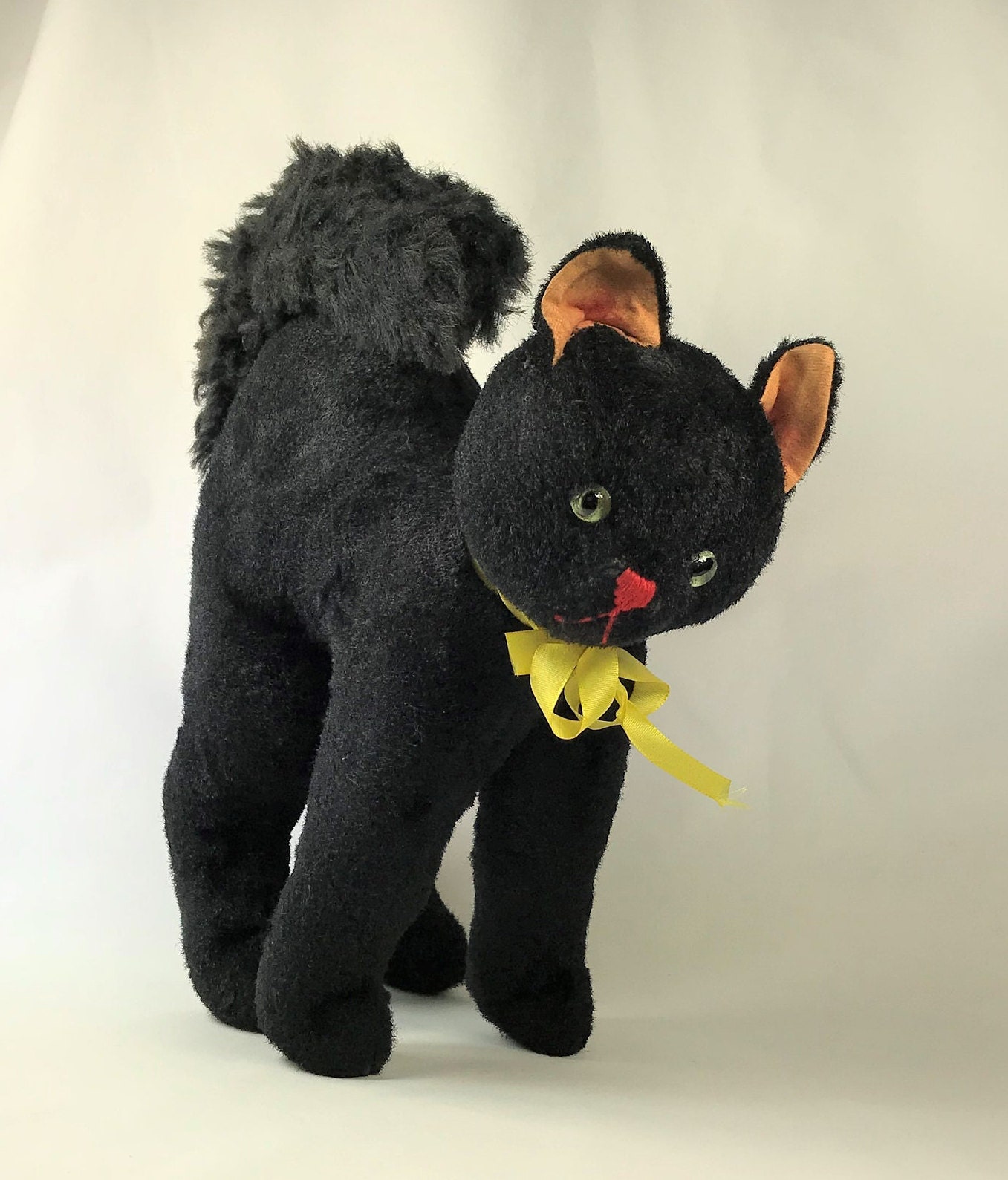large stuffed black cat