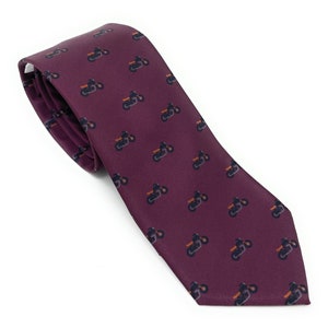 May include: A burgundy silk tie with a repeating pattern of black motorcycles.