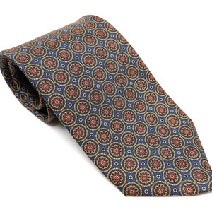 May include: A patterned necktie featuring a repeating floral design in red, tan, and green on a blue background. The tie is rolled up, showcasing the intricate pattern and fabric texture. A classic accessory for formal or business attire.