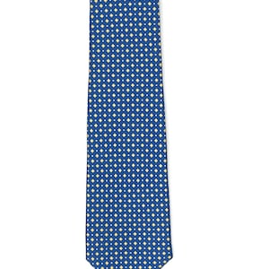 May include: A blue silk tie with a small, white and yellow diamond pattern.