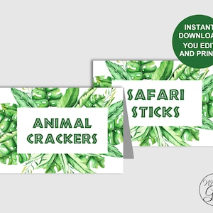 May include: Two printable food labels with a jungle theme. The labels feature a white background with green tropical leaves and the text "Animal Crackers" and "Safari Sticks".