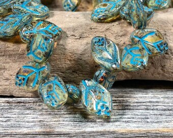 Czech glass leaves crystal transparent with light green picasso finish and aqua blue wash 12X8mm