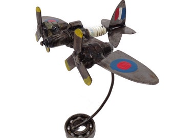 Spark plug Mosquito, WW2 scrap metal aeroplane sculpture.