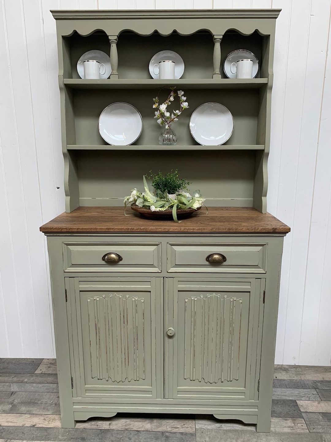 green painted welsh dresser This is an old charm Welsh dresser , painted and stacked full of some of my favourite things . It will be nice when the hyacinth flowers . I've also started a