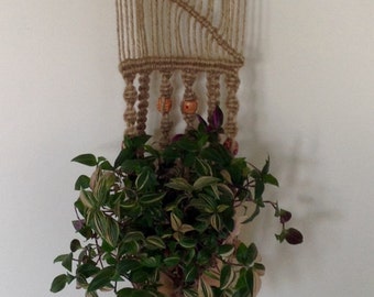 Handcrafted macrame wall plant hanger