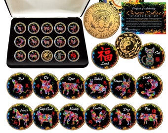 May include: A set of 12 gold-toned coins featuring the Chinese zodiac animals. Each coin has a black background with colourful floral designs and the animal's Chinese character. The coins are displayed in a black velvet box with a certificate of authenticity.