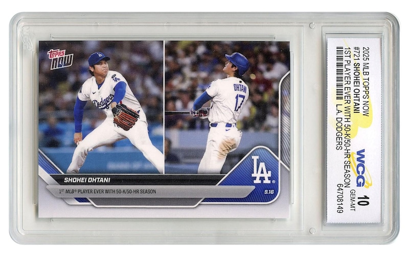 May include: A baseball trading card featuring Shohei Ohtani of the Los Angeles Dodgers. The card shows two action shots of Ohtani in his Dodgers uniform. The card is encased in a protective holder and includes text that reads "2025 MLB Topps Now".