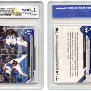May include: A baseball card featuring Shohei Ohtani of the Los Angeles Dodgers. The card is encased in a protective holder and graded by WCG. The front of the card shows two action shots of Ohtani. Text on the card reads "1st Player Ever with 50-K/50-HR Season."