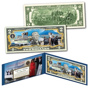 May include: A novelty two dollar bill featuring a portrait of Donald Trump and the text "Donald Trump, 45th President, Air Force One". The bill is a replica of a US dollar bill with a gold border and a certificate of authenticity.