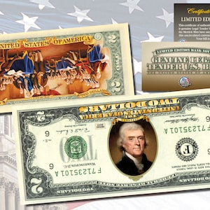 May include: A two dollar bill with a portrait of Thomas Jefferson and a scene of the signing of the Declaration of Independence. The bill is a limited edition bank note and is a collectible work of art.