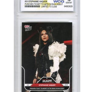 May include: A graded trading card featuring Stephanie Vaquer from the 2025 WWE Topps Now series. The card is graded WCG 10 GEM-MT and is limited to 3,536. The card's text reads "Punches Ticket to MITB in Raw Debut".