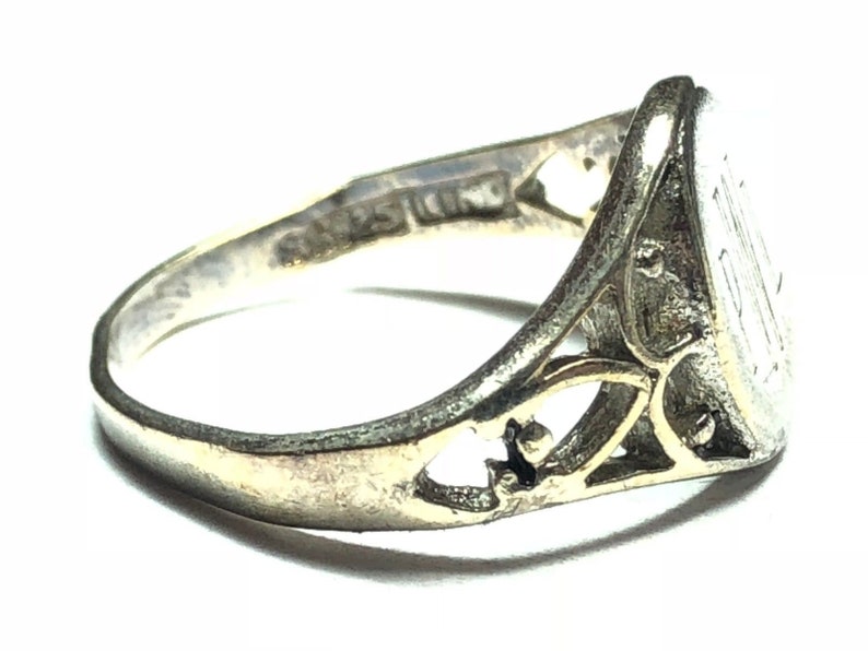 Fantastic Ladies Sterling Silver Ring PWL Size 8 Take A Look!