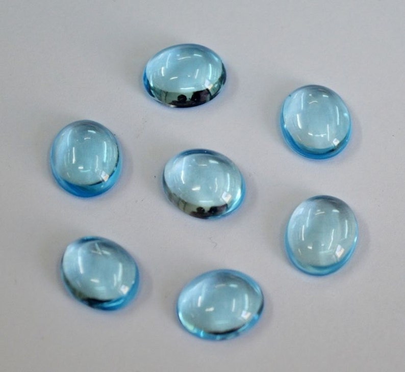10 pic.natural Sky Blue Topaz oval shape cabochon with free shipping
