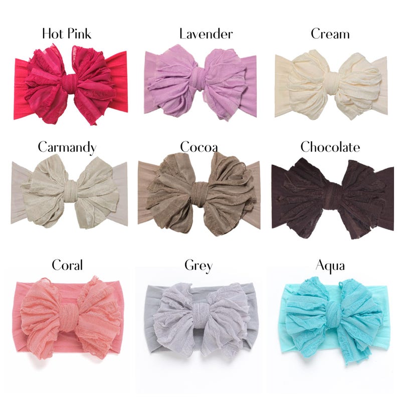 May include: A collection of nine fabric headbands, each featuring a large, ruffled bow. The colors include hot pink, lavender, cream, carmandy, cocoa, chocolate, coral, grey, and aqua. Each headband is labeled with its corresponding color name.