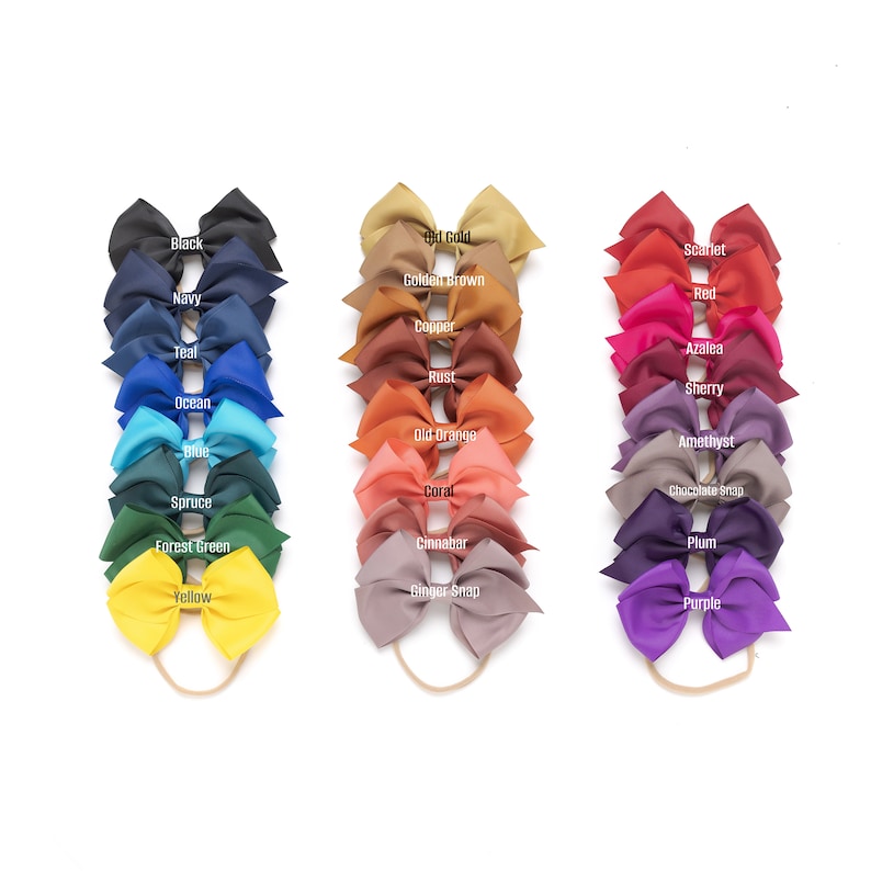 May include: A set of 24 hair bows in various colors, including black, navy, teal, ocean, blue, spruce, forest green, yellow, old gold, golden brown, copper, rust, old orange, coral, cinnabar, ginger snap, scarlet, red, azalea, sherry, amethyst, chocolate snap, plum, and purple. Each bow is attached to a nude elastic headband.
