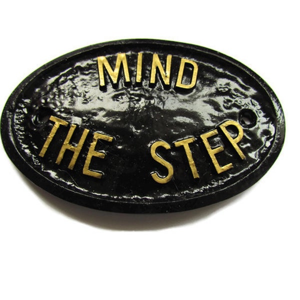 Mind The Step House garden wall plaque In Black with GOLD Raised Lettering