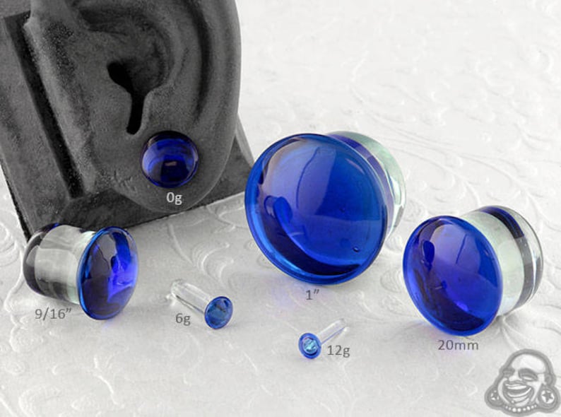 1//2 White Pair of Glass Single Flared Solid Plugs