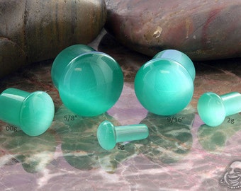 SF Aqua Cat's Eye plugs 4g, 2g, 0g, 00g, 7/16, 1/2", 9/16, 5/8 (Sold as pairs)