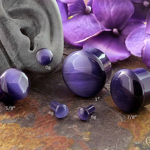 SF Purple Cat Eye plugs 6g, 4g, 2g (6mm), 0g, 00g (10mm), 7/16&quot; (11mm), 1/2&quot; (12.25mm), 9/16&quot; , 5/8, 3/4&quot;, 7/8&quot;, 1&quot; (Sold as pairs)