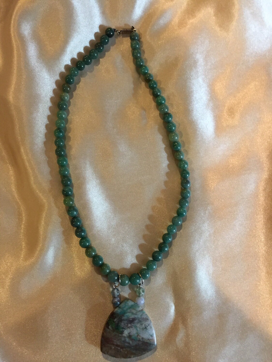 Beautiful polished jade beaded necklace with raw jade pendant. Etsy