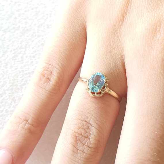 Cushion Cut Blue Topaz Ring with Diamond Halo | Bichsel Jewelry