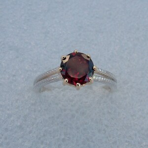 Gold and silver garnet ring. Garnet ring.  Garnet solitaire.