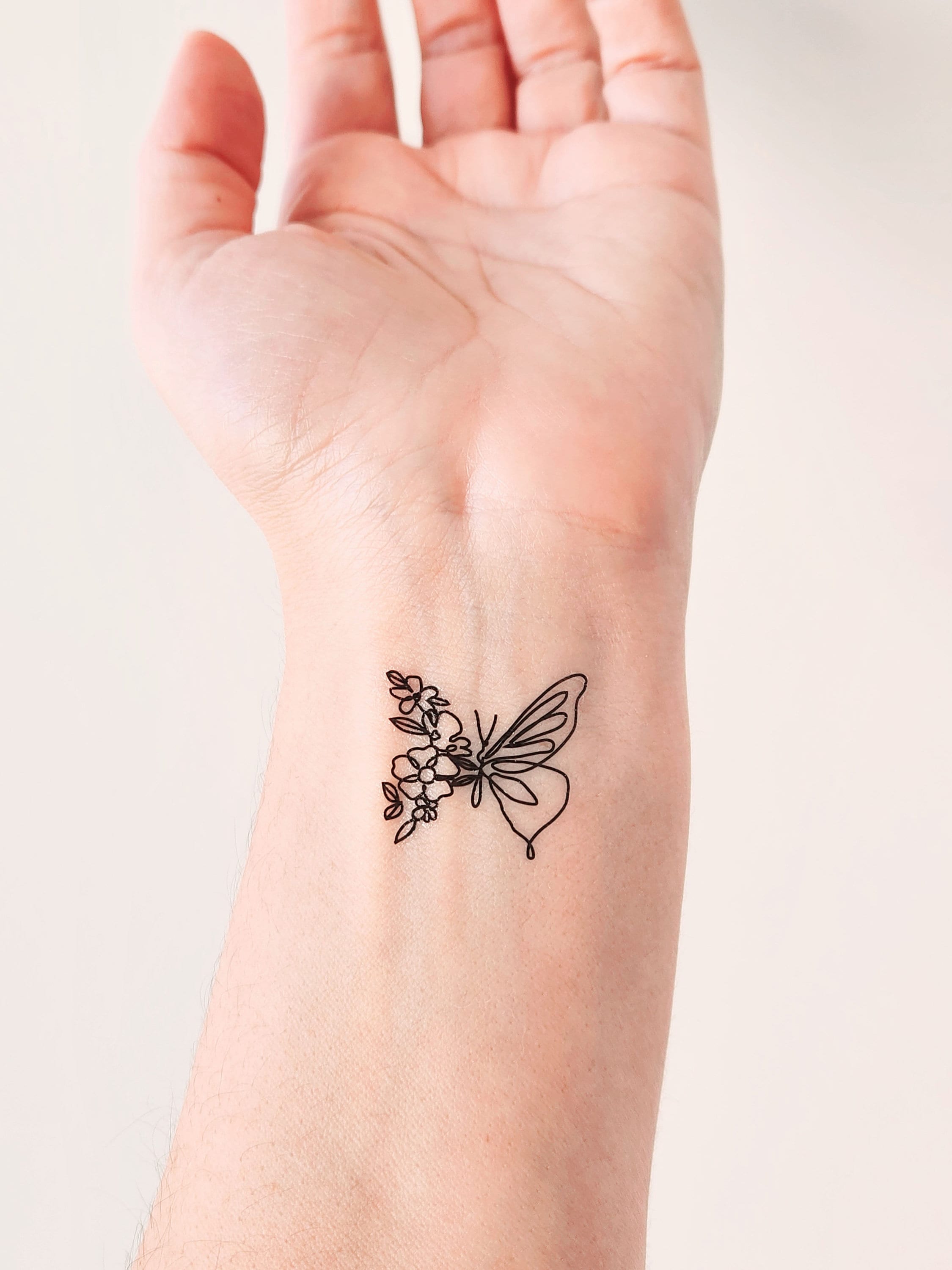 Vintage Butterfly & Flower Tattoo Design