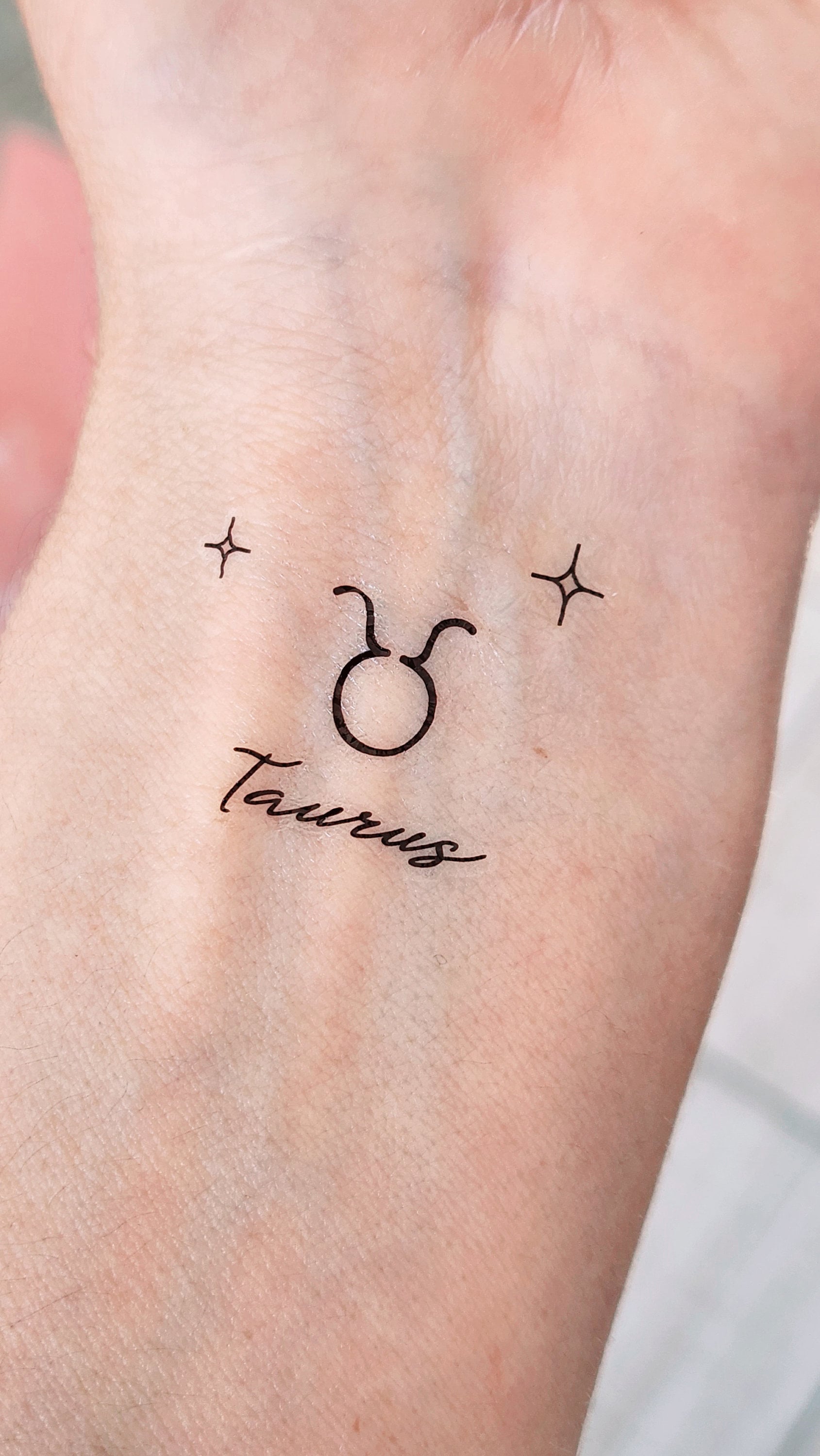 Aquarius and Taurus Tattoo: A Cosmic Match