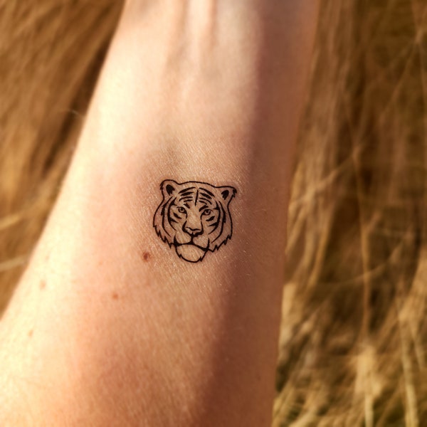 4 têtes de tigre tatouage temporaire. Exprimez votre félinité intérieure avec nos tatouages temporaires de tigre.