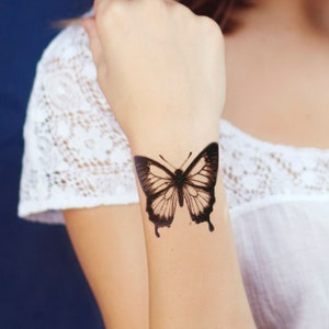 traditionnal black butterfly temporary tattoo, realistic vintage butterfly temporary tattoo
