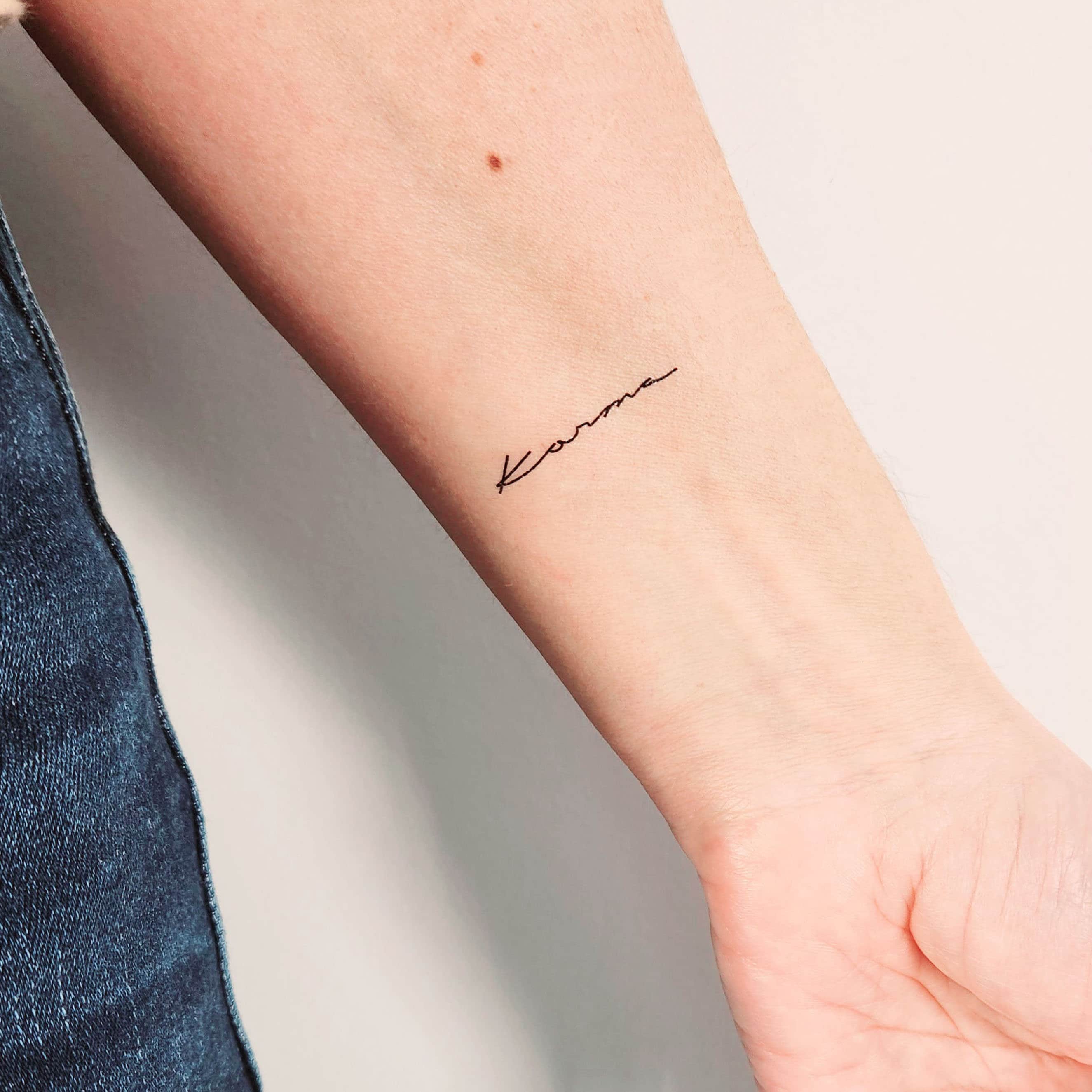 Karma tattoo in red ink | Karma tattoo, Tattoos, Get a tattoo