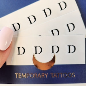 Temporäres Tattoo mit dem Buchstaben D (12er-Set)